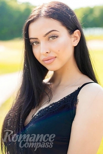 Ukrainian mail order bride Marina from Lozova with black hair and green eye color - image 1