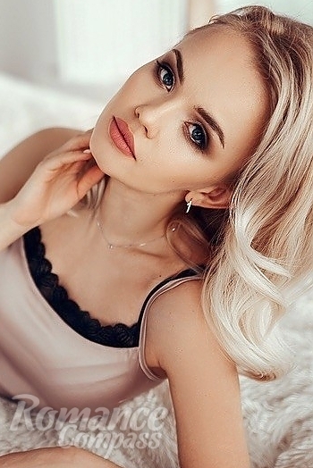 Ukrainian mail order bride Evgenia from Moscow with blonde hair and blue eye color - image 1