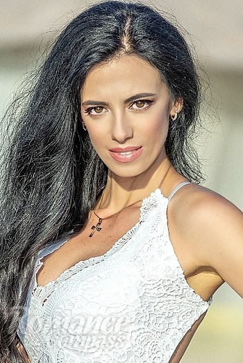 Ukrainian mail order bride Zoryana from Lviv with black hair and hazel eye color - image 1