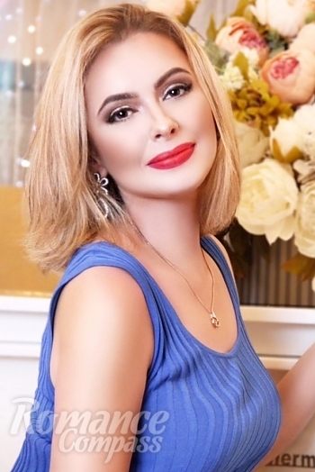 Ukrainian mail order bride Anna from Kharkov with blonde hair and brown eye color - image 1