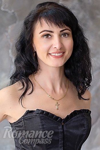 Ukrainian mail order bride Lubov from Kharkov with black hair and brown eye color - image 1