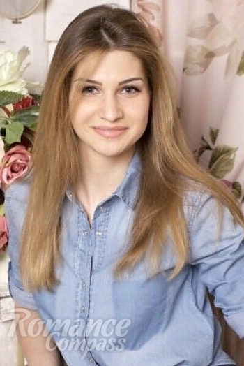 Ukrainian mail order bride Lubov from Kharkov with light brown hair and blue eye color - image 1