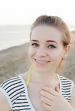Ukrainian mail order bride Yulia from Kiev with light brown hair and blue eye color - image 2