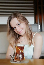 Ukrainian mail order bride Yulia from Kiev with light brown hair and blue eye color - image 6