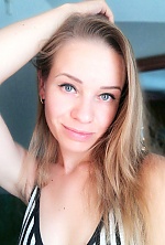 Ukrainian mail order bride Yulia from Kiev with light brown hair and blue eye color - image 4