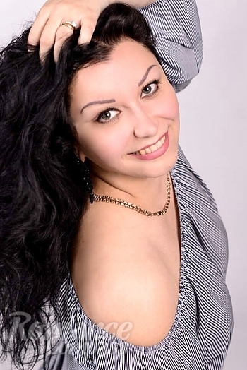 Ukrainian mail order bride Julia from Kiev with black hair and green eye color - image 1