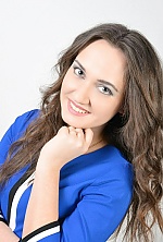 Ukrainian mail order bride Marina from Krivoy Rog with light brown hair and blue eye color - image 3