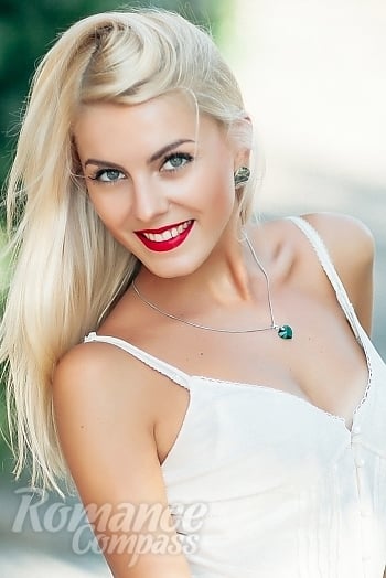 Ukrainian mail order bride Tatyana from Nikolaev with blonde hair and blue eye color - image 1