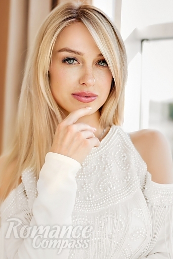 Ukrainian mail order bride Ekaterina from Lugansk with blonde hair and green eye color - image 1