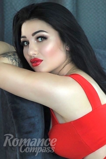 Ukrainian mail order bride Ilona from Odessa with black hair and brown eye color - image 1