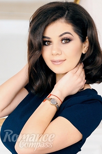 Ukrainian mail order bride Anna from Slobozia with brunette hair and brown eye color - image 1