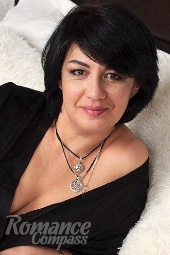 Ukrainian mail order bride Ekaterina from Kiev with black hair and brown eye color - image 1