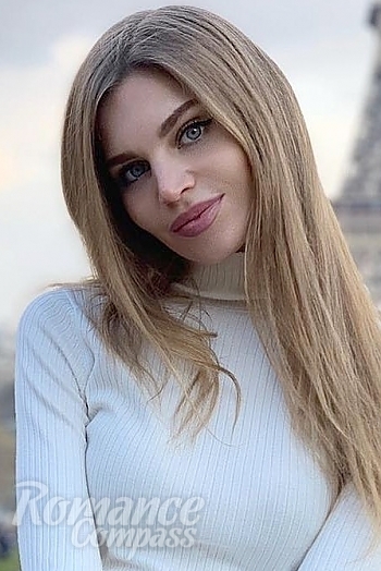 Ukrainian mail order bride Anastasia from Saint Petersburg with black hair and hazel eye color - image 1