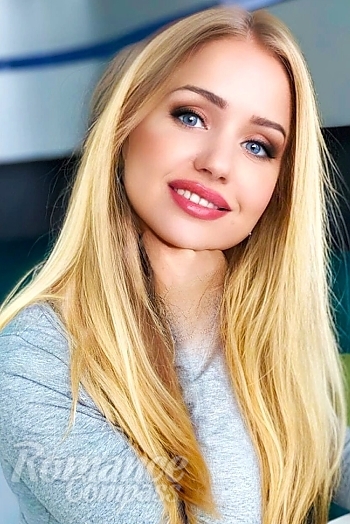 Ukrainian mail order bride Oksana from Dnipro with blonde hair and blue eye color - image 1