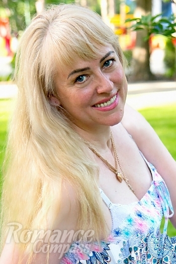 Ukrainian mail order bride Larisa from Kharkiv with blonde hair and blue eye color - image 1