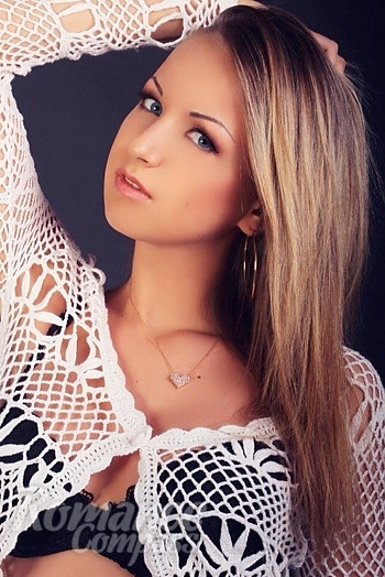 Ukrainian mail order bride Liana from Kiev with blonde hair and black eye color - image 1