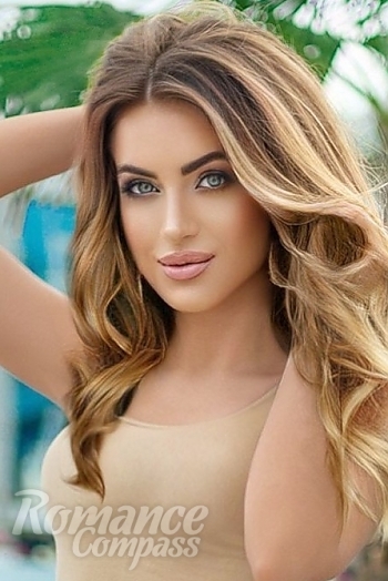 Ukrainian mail order bride Victoria from Odessa with light brown hair and blue eye color - image 1