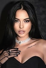 Ukrainian mail order bride Roxolana from Lvov with black hair and hazel eye color - image 18