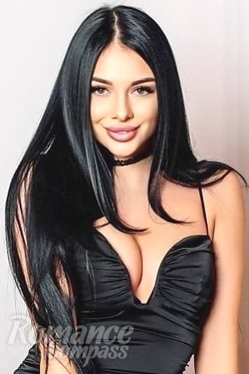 Ukrainian mail order bride Roxolana from Lvov with black hair and hazel eye color - image 1