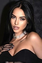 Ukrainian mail order bride Roxolana from Lvov with black hair and hazel eye color - image 17