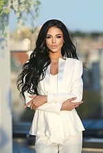 Ukrainian mail order bride Roxolana from Lvov with black hair and hazel eye color - image 8