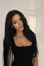 Ukrainian mail order bride Roxolana from Lviv with black hair and hazel eye color - image 18
