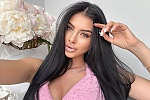 Ukrainian mail order bride Roxolana from Lviv with black hair and hazel eye color - image 12