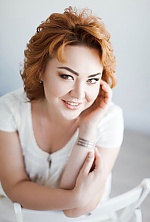 Ukrainian mail order bride Anna from Nikolaev with red hair and green eye color - image 11