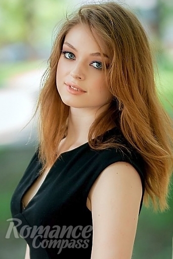 Ukrainian mail order bride Daria from Poltava with auburn hair and grey eye color - image 1