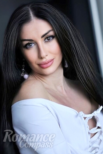 Ukrainian mail order bride Diana from Odesa with black hair and grey eye color - image 1
