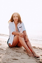 Ukrainian mail order bride Lina from Odessa with light brown hair and blue eye color - image 6