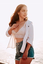 Ukrainian mail order bride Lina from Odessa with light brown hair and blue eye color - image 4