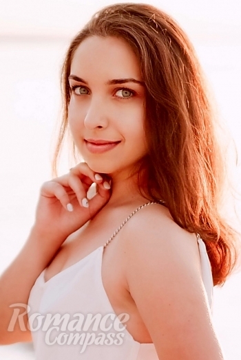 Ukrainian mail order bride Lina from Odessa with light brown hair and blue eye color - image 1