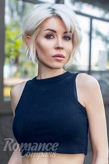Ukrainian mail order bride Alexandra from Kiev with blonde hair and blue eye color - image 1