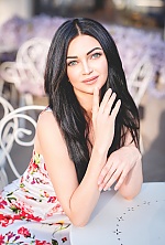Ukrainian mail order bride Olga from Torquay with black hair and blue eye color - image 4