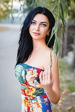 Ukrainian mail order bride Olga from Torquay with black hair and blue eye color - image 14