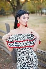Ukrainian mail order bride Olga from Torquay with black hair and blue eye color - image 12