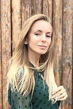Ukrainian mail order bride Olga from Kiev with blonde hair and grey eye color - image 3