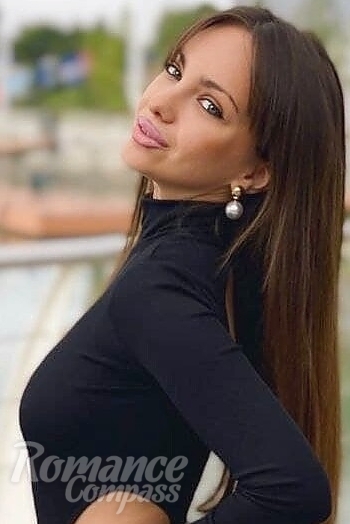 Ukrainian mail order bride Yuliya from Kiev with light brown hair and blue eye color - image 1