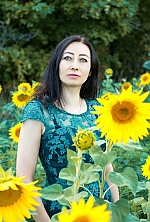 Ukrainian mail order bride Irina from Kharkov with black hair and green eye color - image 2
