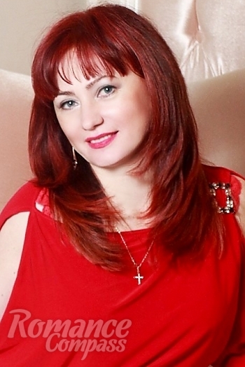 Ukrainian mail order bride Alla from Kiev with red hair and blue eye color - image 1