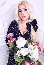 Ukrainian mail order bride Ekaterina from Kharkiv with blonde hair and blue eye color - image 5