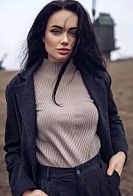 Ukrainian mail order bride Anastasia from Kyiv with black hair and blue eye color - image 10