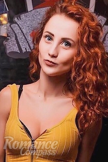 Ukrainian mail order bride Roxolana from Kiev with red hair and blue eye color - image 1