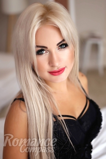 Ukrainian mail order bride Olga from Kharkov with blonde hair and blue eye color - image 1