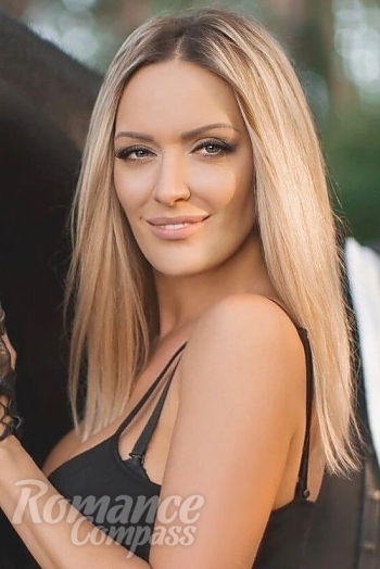 Ukrainian mail order bride Yulia from Kiev with blonde hair and hazel eye color - image 1