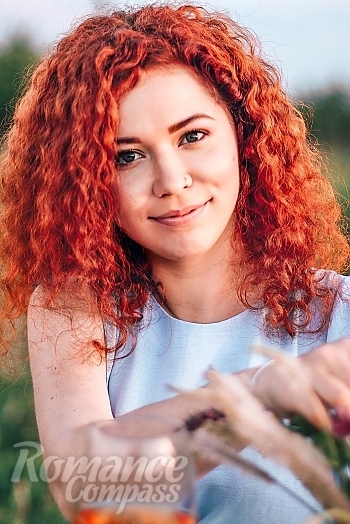 Ukrainian mail order bride Ninel from Kramatorsk with red hair and grey eye color - image 1