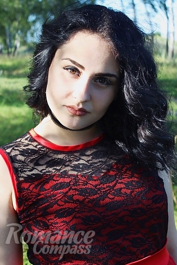 Ukrainian mail order bride Karina from Kiev with black hair and brown eye color - image 1