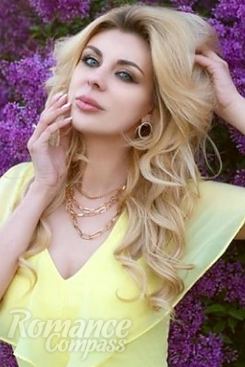 Ukrainian mail order bride Vika from Kiev with blonde hair and blue eye color - image 1