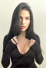 Ukrainian mail order bride Inessa from Kiev with black hair and green eye color - image 9